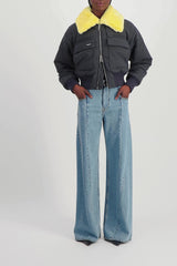 Extra wide leg blue denim jeans with cut-out belt