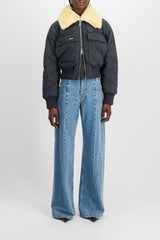 Extra wide leg blue denim jeans with cut-out belt