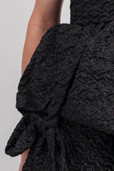 Bustier dress with asymmetrical skirt and bow